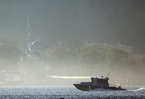 A Turkish police speedboat patrols the god-covered Bosporus strait, in the outskirts of Istanbul, close to the Black Sea, Thursday, April 27, 2017. Turkey's coastal safety authority says that a Russian navy reconnaissance ship has sunk off Istanbul after colliding with a freighter. Authorities say that all 78 personnel on the Russian vessel Liman are accounted for after it collided with the Togo-flagged freighter Youzarsif H. in the Black Sea. (AP Photo/Lefteris Pitarakis)