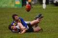 Joel Quarrell being tackled while playing country football.