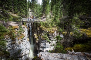 Two women look at Maligne Canyon.