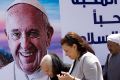 A billboard welcomes Pope Francis at St Mark's Cathedral in Cairo, Egypt.