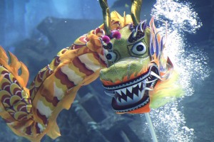 Divers perform an underwater dragon dance at the S.E.A. Aquarium.