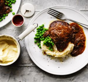 Salisbury steaks with mushroom and onion gravy.