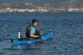 Kayaker Michael Thomas passes the village of Eceabat on his way to Anzac cove. 21st of April 2015. ANZAC Centenary ...