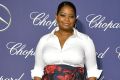 Evening elegance ... Octavia Spencer teams a white shirt with an evening skirt to perfection.