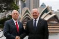 US Vice-President Mike Pence, left, shakes hands with Australia's Governor-General Peter Cosgrove, Her Majesty Queen ...