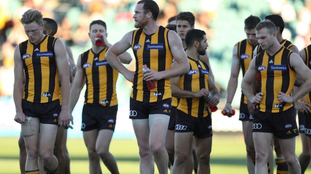 Thrashed: It was another long walk off the ground for the Hawks after Saturday's big loss to St Kilda in Launceston. 