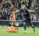 Full flight: Besart Berisha after scoring in the semi-final against the Roar.