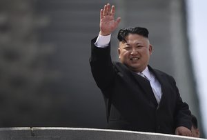 North Korean leader Kim Jong Un waves during a military parade on Saturday, April 15, 2017, in Pyongyang, North Korea to celebrate the 105th birth anniversary of Kim Il Sung, the country's late founder and grandfather of current ruler Kim Jong Un.