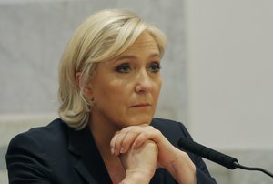 Far-right candidate for the 2017 French presidential election Marine Le Pen attend with Nicolas Dupont-Aignan a media conference in Paris, France, Saturday, April 29, 2017.