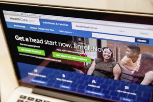 HealthCare.gov website, where people can buy health insurance (ObamaCare), is displayed on a laptop screen in Washington