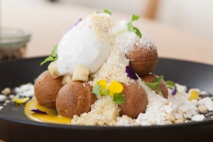 Belgian waffle balls with passionfruit cream, banana crumb and pandan ice-cream at Abbotsford cafe AU79.