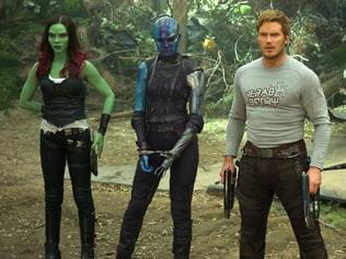 This image released by Disney-Marvel shows Zoe Saldana, from left, Karen Gillan, Chris Pratt, Dave Bautista and Rocket, voiced by Bradley Cooper, in a scene from, "Guardians Of The Galaxy Vol. 2." (Disney-Marvel via AP)