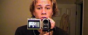 Heath Ledger records himself with a handycam.