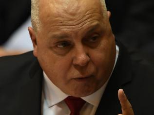 Victorian Treasurer Tim Pallas hands down the state budget in the Legislative Assembly in Melbourne, Tuesday, May 2, 2017. (AAP Image/Julian Smith) NO ARCHIVING