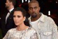 Kim Kardashian and Kanye West will not attend this year's Met Gala together.