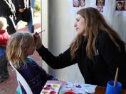 CMA volunteer face painter Katie Saarikko was kept busy.