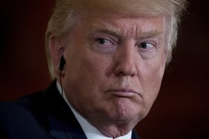 President Donald Trump listens as Italian Prime Minister Paolo Gentiloni speaks during a news conference in the East Room of the White House in Washington, Thursday, April 20, 2017.