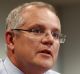 Treasurer Scott Morrison flags further action if the budget fails to cool the housing market. 