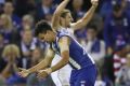 The Bulldogs defeat North Melbourne in the first Good Friday match.