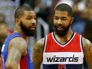 WASHINGTON, DC - FEBRUARY 19: Marcus Morris #13 of the Detroit Pistons talks with his twin brother Markieff Morris #5 of the Washington Wizards in the second half at Verizon Center on February 19, 2016 in Washington, DC. NOTE TO USER: User expressly acknowledges and agrees that, by downloading and or using this photograph, User is consenting to the terms and conditions of the Getty Images License Agreement. (Photo by Rob Carr/Getty Images)