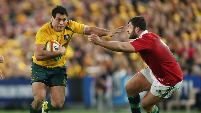 George Smith of the Wallabies takes on the Lions defence in 2013.