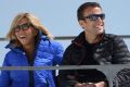 Emmanuel Macron and his wife Brigitte catch a chairlift to lunch during a campaign visit in Bagneres-de-Bigorre, ...