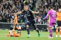 Full flight: Besart Berisha after scoring in the semi-final against the Roar.