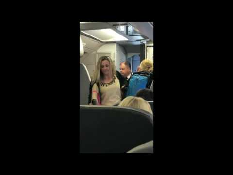 RAW: Watch intense confrontation between passengers, American Airlines flight attendant