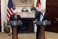US President Donald Trump (right) speaks while Mahmoud Abbas, president of Palestine during a joint press conference in ...