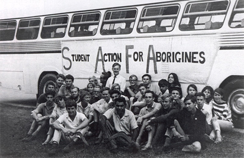 SAFA Students sitting in front of the Freedom Ride bus - Photograph reproduced with permission of Wendy Watson-Ekstein (nee Golding) and supplied by Ann Curthoys.