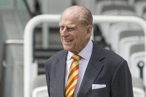 FILE - In this Wednesday, May 3, 2017 file photo Britain's Prince Philip, the Duke of Edinburgh, smiles during his visit to Lord's Cricket Ground to open the new Warner Stand, in London.