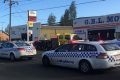 G.E.L. Motors in North Geelong where a police gun has gone off in a holster during a scuffle.