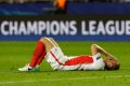 Monaco's Kamil Glik covers his face during the Champions League semifinal first leg soccer match between Monaco and Juventus.