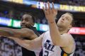 Los Angeles Clippers forward Luc Richard Mbah a Moute and Utah Jazz forward Joe Ingles (right) vie for a rebound in game six.