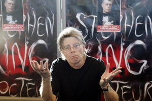 File - US author Stephen King poses for the cameras, during a promotional tour for his latest novel, 'Doctor Sleep', a sequel to 'The Shining', at a library in Paris, Wednesday, Nov. 13, 2013.