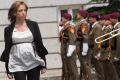 Spain's Defence Minister Carme Chacon reviewing troops while heavily pregnant became a symbol of a new era in Spanish ...