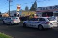 G.E.L. Motors in North Geelong where a police gun has gone off in a holster during a scuffle.