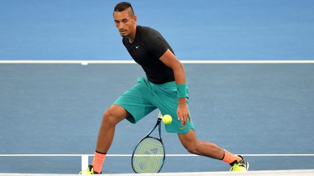The tweener: Kyrgios practices his favourite party trick.