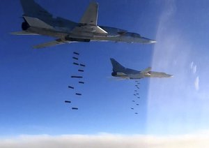 In this photo provided by the Russian Defense Ministry Press Service shows Russian air force Tu-22M3 bombers strike the Islamic State targets in Syria, Monday, Jan. 23, 2017.