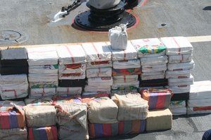 120604-N-ZZ999-002 PACIFIC OCEAN (June 4, 2012) One hundred and twelve bales of cocaine recovered from a drug interdiction are offloaded onto the deck of the guided-missile frigate USS Nicholas (FFG 47). Navy and Coast Guard personnel recovered approximately 4,910 pounds of the contraband after it was dumped from a vessel during drug interdiction operations in support of Operation Martillo off the Pacific Coast of Colombia. The estimated street value of the 112 bales is more than $367 million. Operation Martillo is a U.S., European, and western Hemisphere partner nation effort targeting illicit trafficking routes in coastal waters along the Central American isthmus.