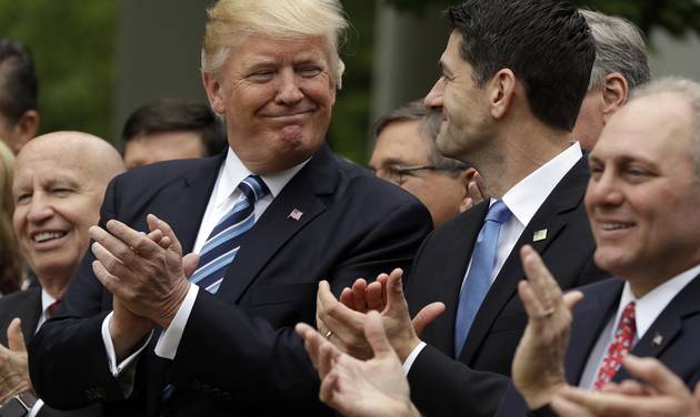 President Donald Trump talks with House Speaker Paul Ryan of Wis., in the Rose Garden of the...