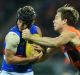 On the edge: Toby Greene accepted a two-match ban for this hit on Caleb Daniel.