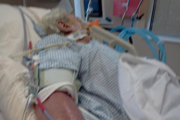 Timothy Strayer in his hospital bed in Dearborn County ICU after spending just one month behind bars at the county jail