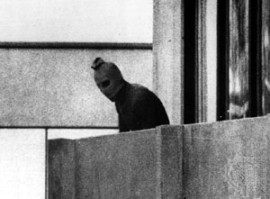 A Palestinian terrorist appearing on a balcony in the Munich Olympic Village, where members of the Israeli team were being held hostage.