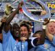 Dwight Yorke and Sydney FC celebrate the inaugural championship.