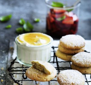 Neil Perry Recipe - Poached Strawberries , honey labneh and spiced buscuits.