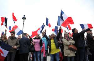 Voters are waving flags after the victory of f Presidential candidate Emmanuel M...