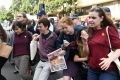 Police officers remove students protesting at Malcolm Turnbull's Sydney office.