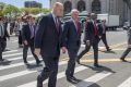 Malcolm Turnbull walks towards New York's Ted Weiss Federal Building with FBI Assistant Director, William F. Sweeney.