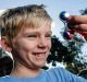 Callum Knight, 7, shows off his spinner.
